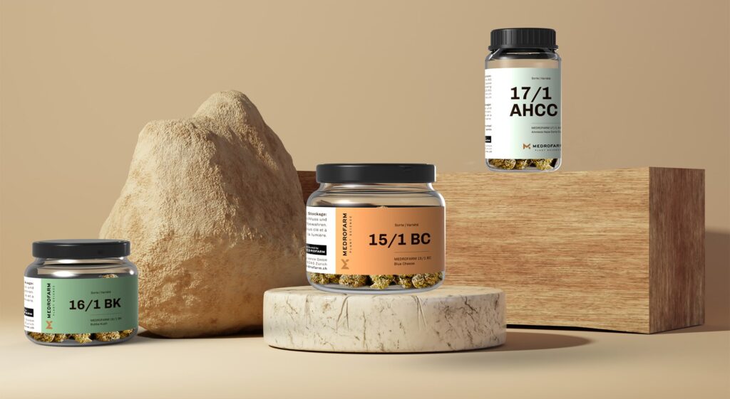 Various medicinal cannabis flowers packaged in cans by Medrofarm, these beautifully presented.